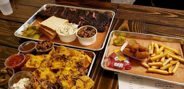 BBQ combo plate with ribs, brisket, beans and coleslaw